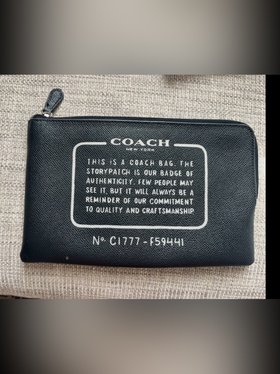 Coach Handbags - COACH Black Leather Zip Pouch with White Print story patch